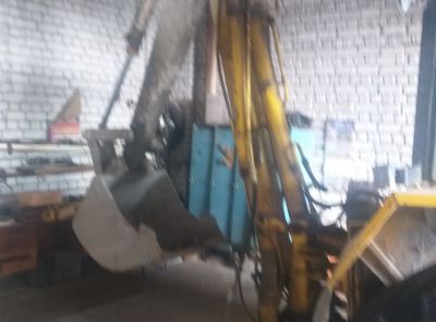 Экскаватор-погрузчик Амкодор 702 ТО-49